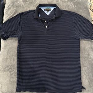 Mens Tommy polo. Size M, blue with stripes.